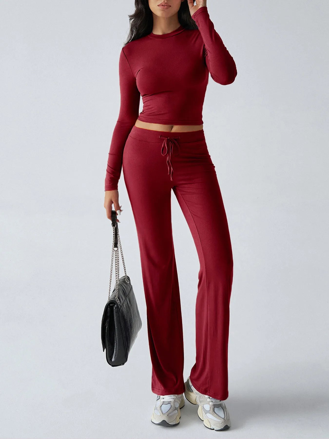 Trendsi Red Top and Pant Set featuring a fitted long sleeve top and flared pants for a stylish look