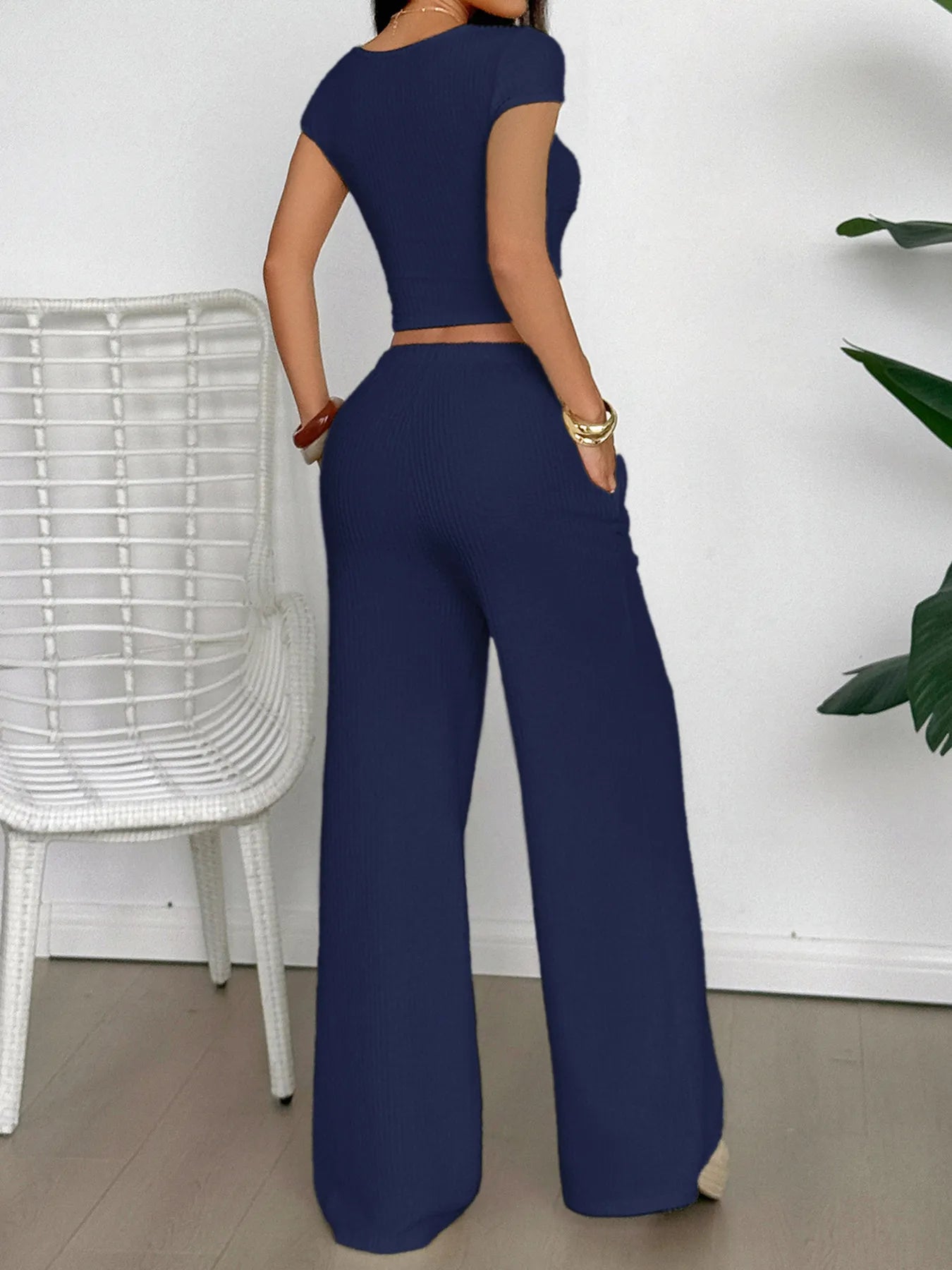 Navy Blue Top and Pants Set featuring a fitted crop top and wide-leg trousers with pockets
