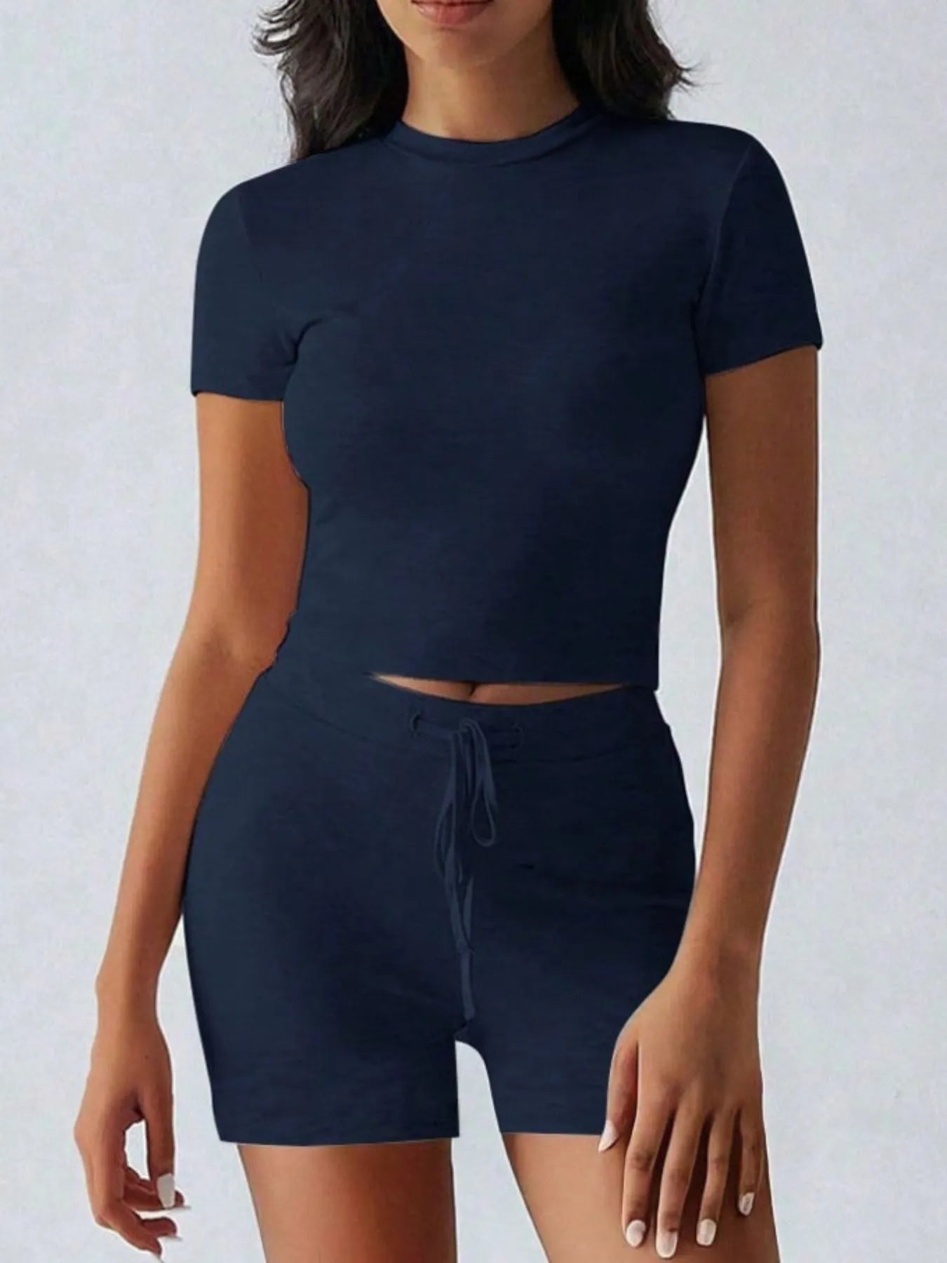 Stylish navy blue top with matching shorts, perfect for casual summer outings