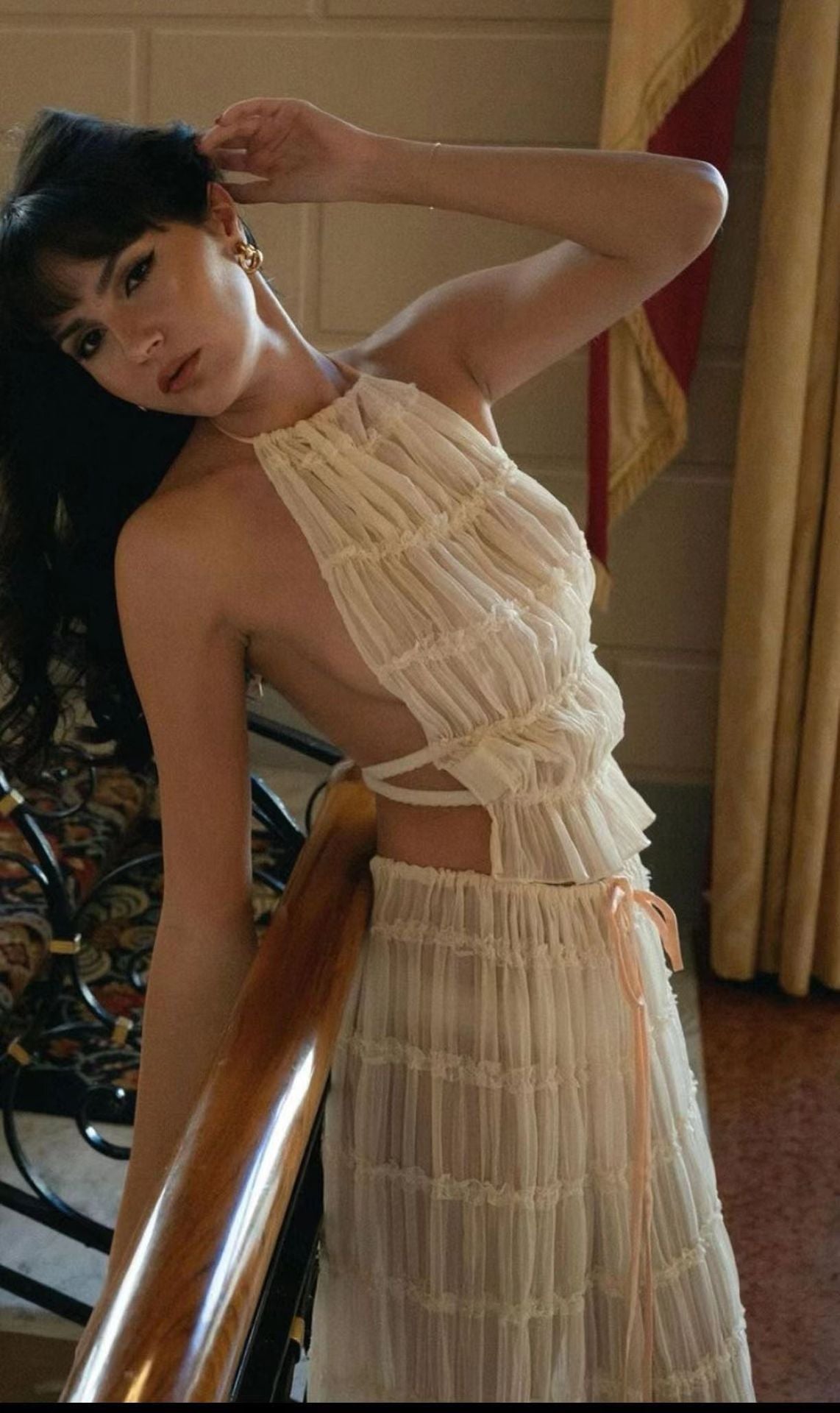 Model wearing a Trendy Halter Top & Maxi Skirt in elegant fabric with ruffled design