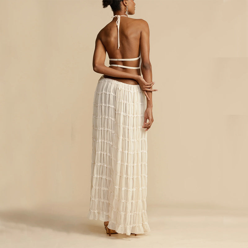 Elegant woman wearing a Trendy Halter Top & Maxi Skirt in a soft fabric with a stylish design