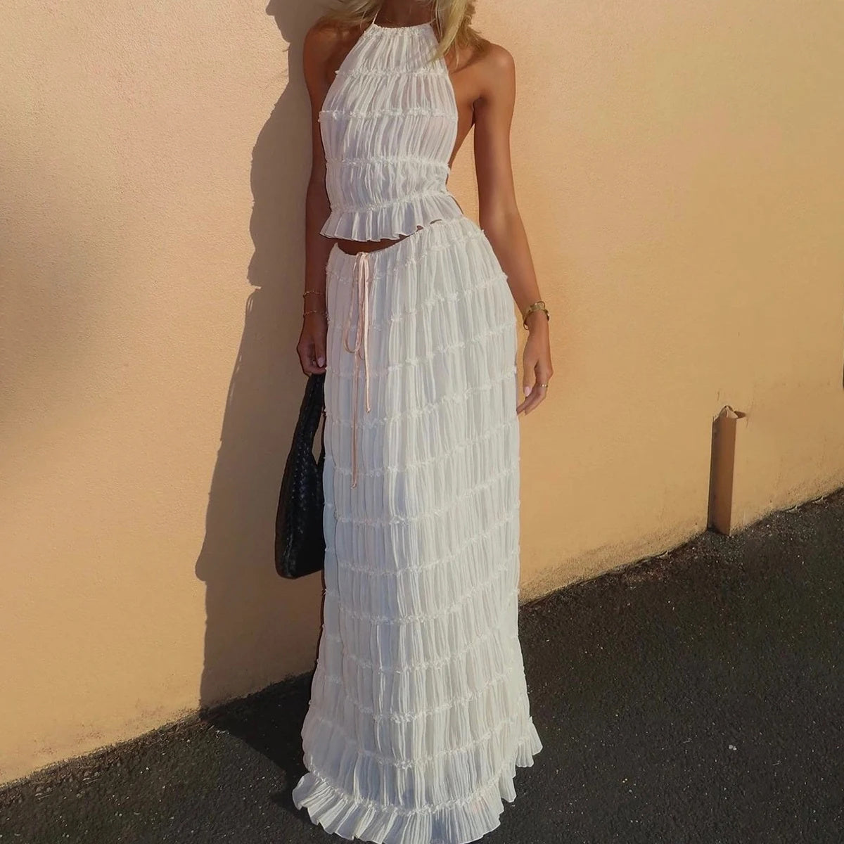 Trendy Halter Top & Maxi Skirt in White with Ruffled Details for a Stylish Summer Look