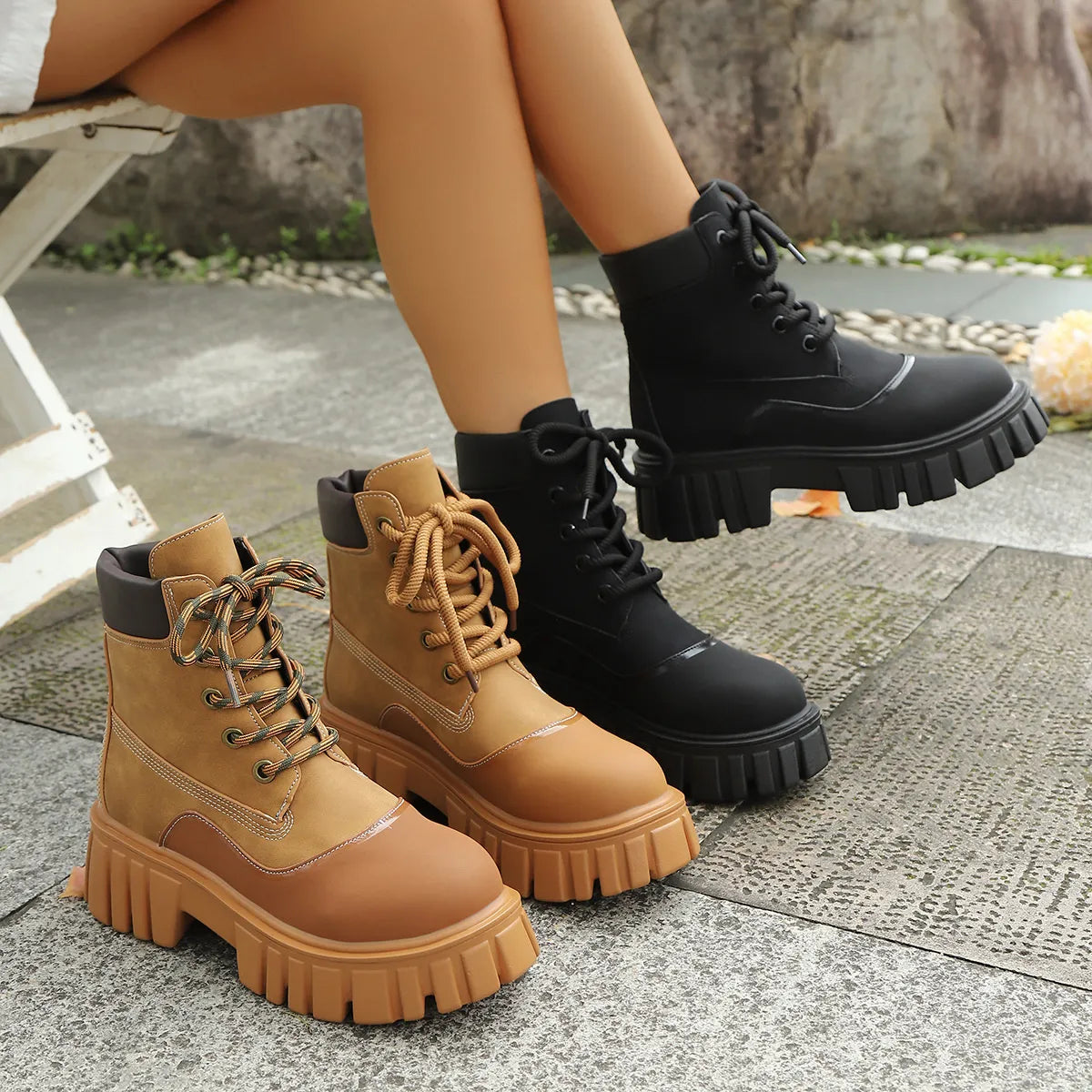 Trendsi Platform Combat Boots in black worn and tan pair displayed with chunky lug sole and lace up design