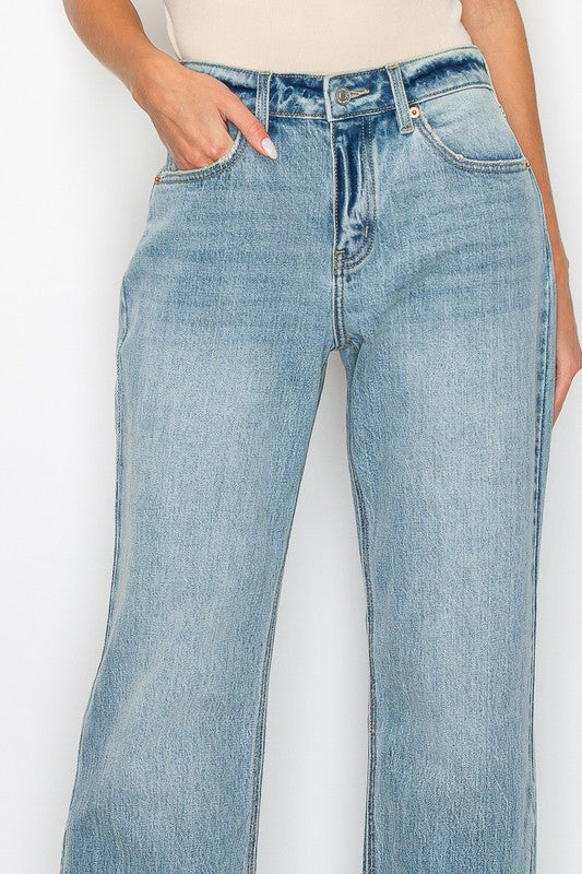Artemis Vintage women's mid rise flare jeans in light wash denim with classic five pocket styling
