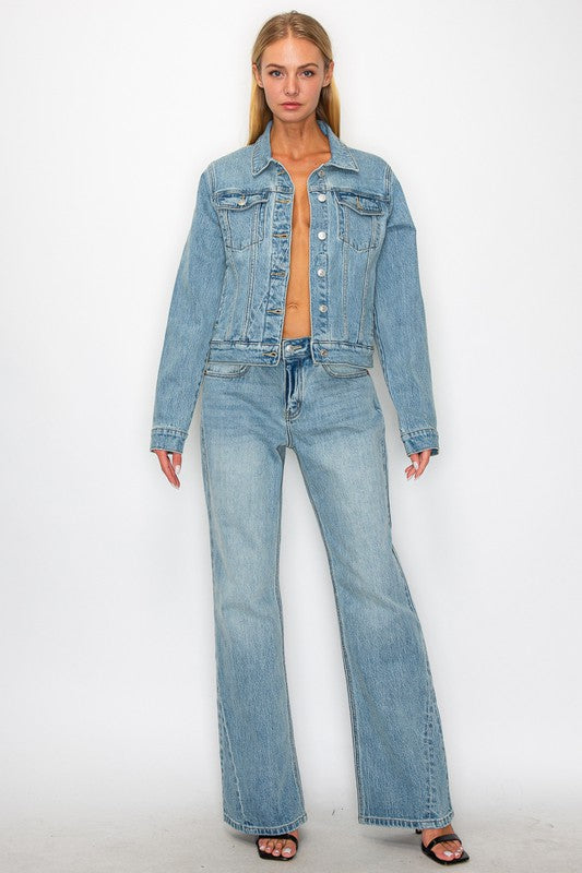 Artemis Vintage women's mid rise flare jeans in light wash modeled with matching denim jacket and sandals