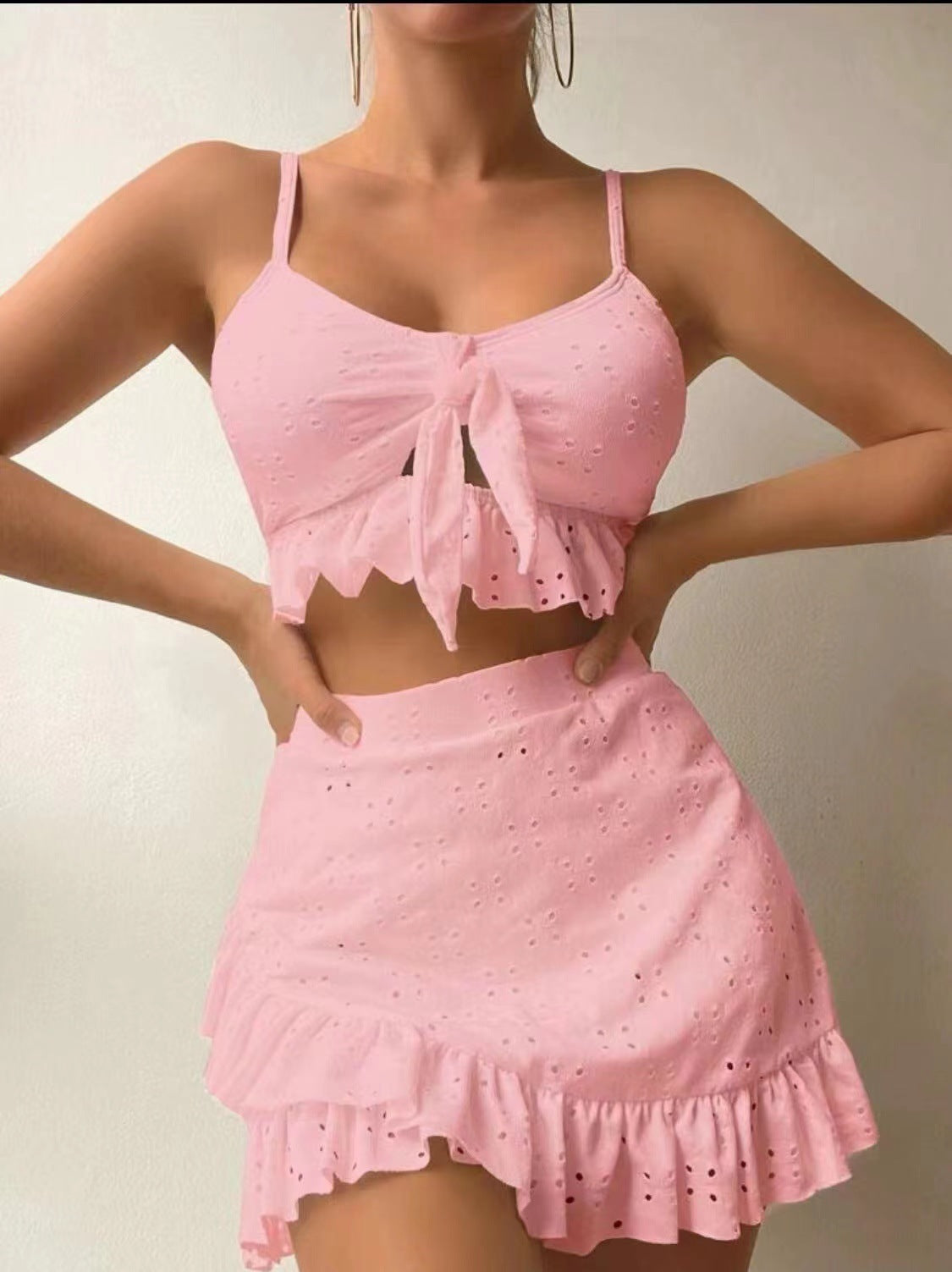 Trendsi pink ruffle design beach bikini with eyelet fabric and tie front top paired with matching skirt