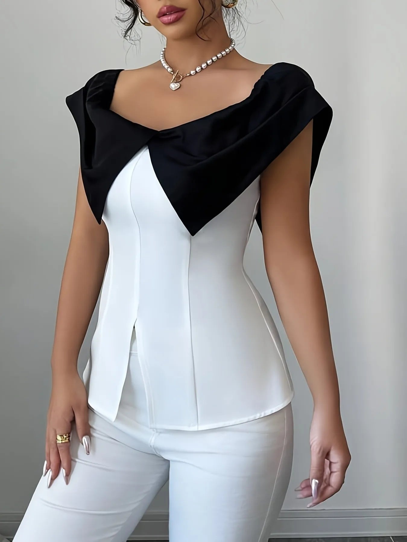 Slit Contrast Color Cap top in black and white fitted style by Trendsi
