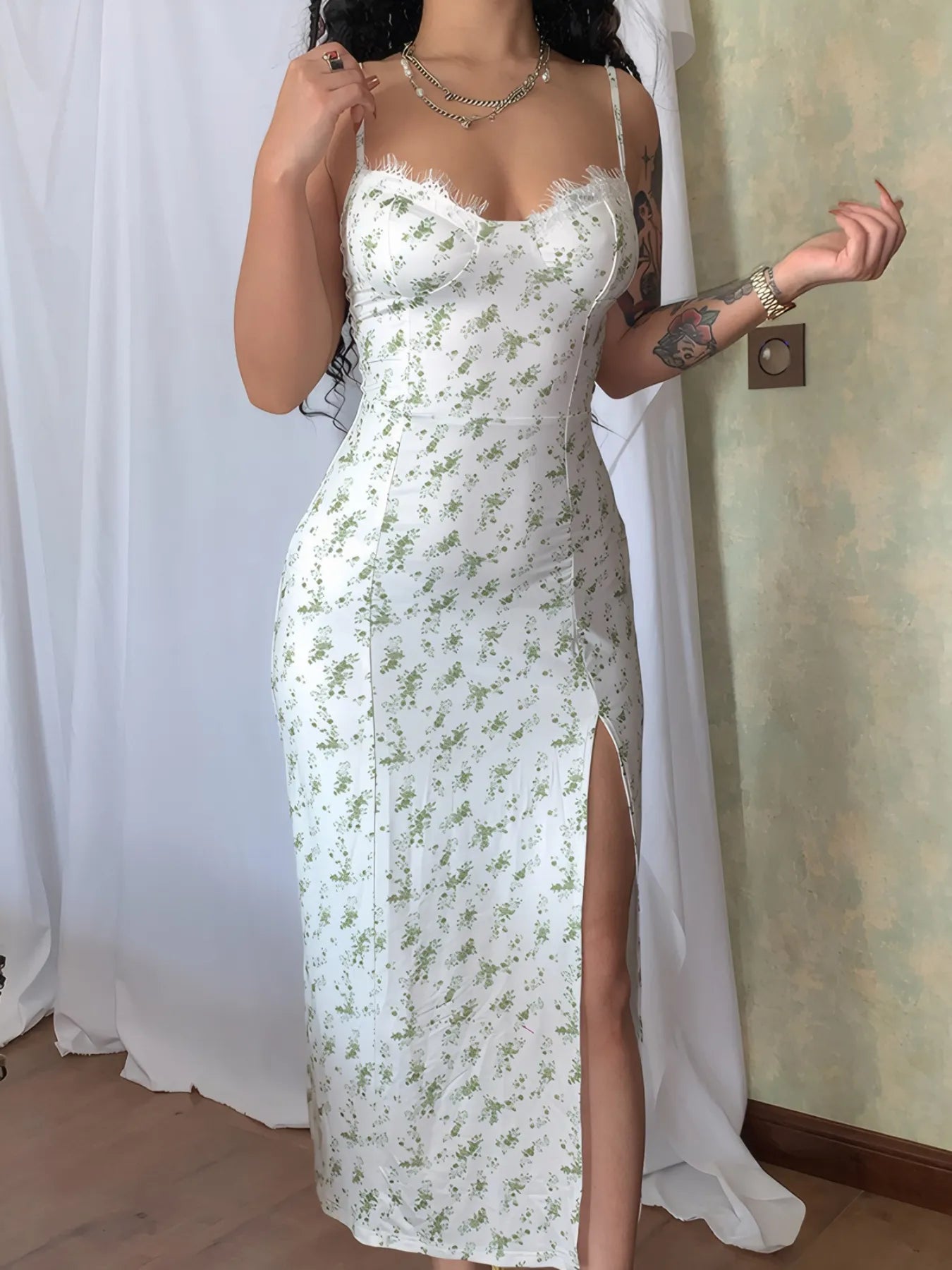 Model showcasing a Split Print Cami Dress with a floral design and thigh-high slit for a chic look