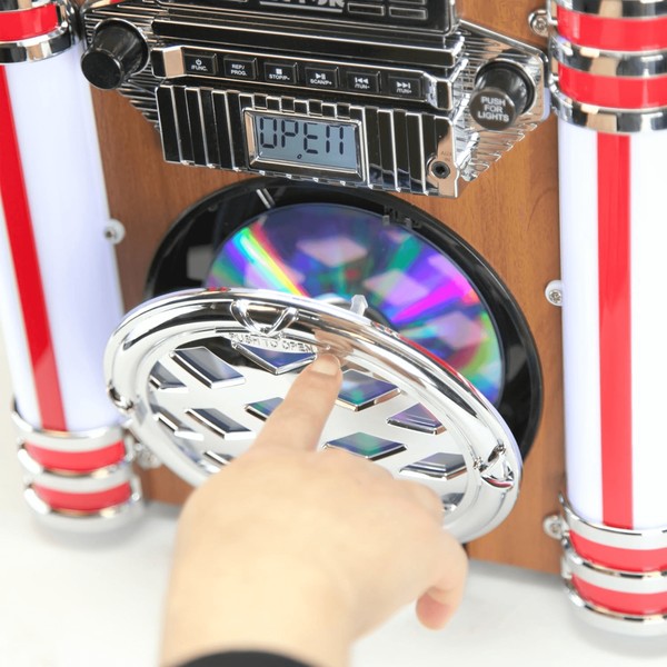 Victor Broadway II Desktop CD Jukebox with hand opening CD tray showcasing colorful disc inside