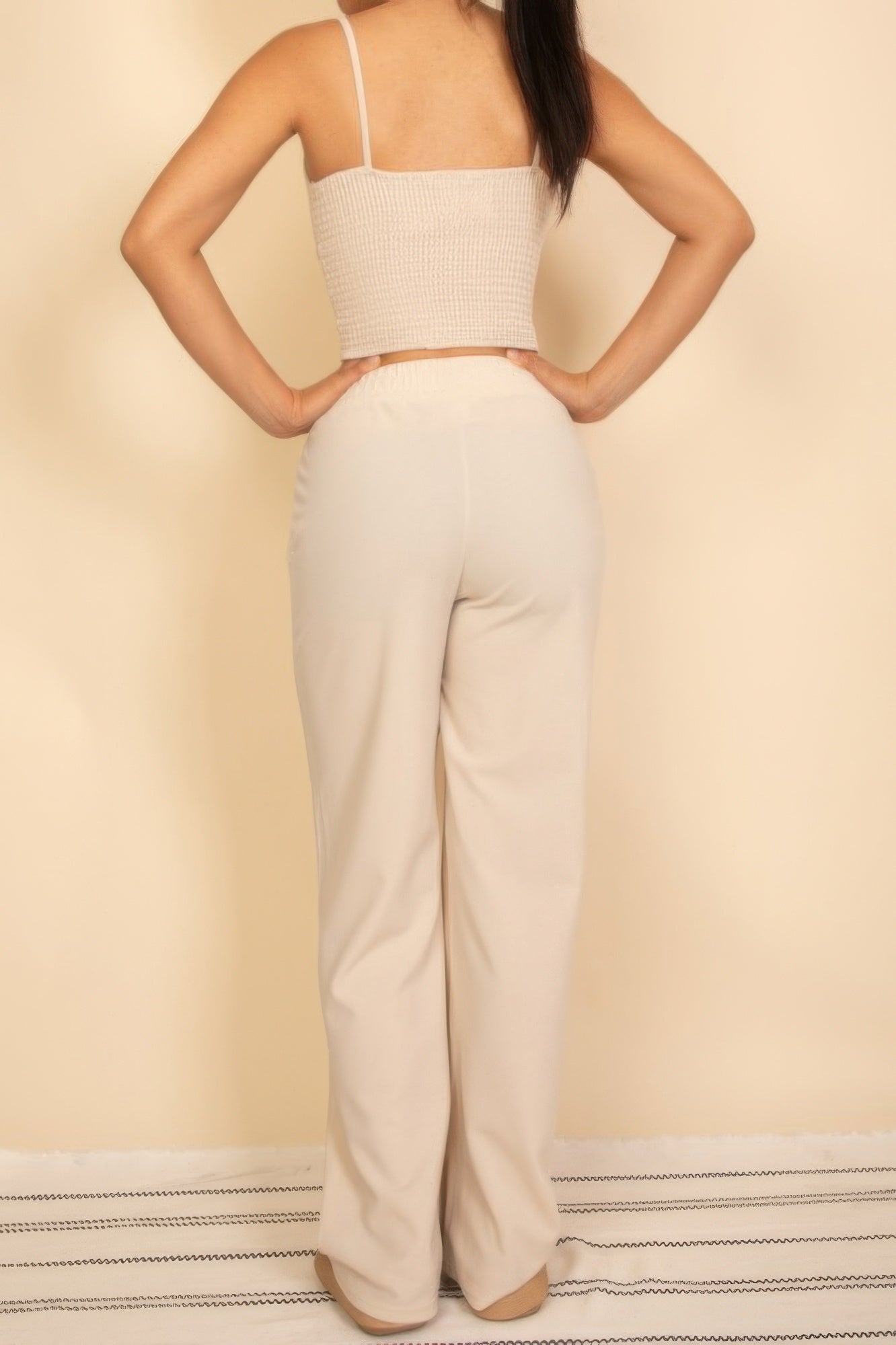 Back view of CCWHOLESALECLOTHING Wide Leg Pants Set with a fitted top and loose pants