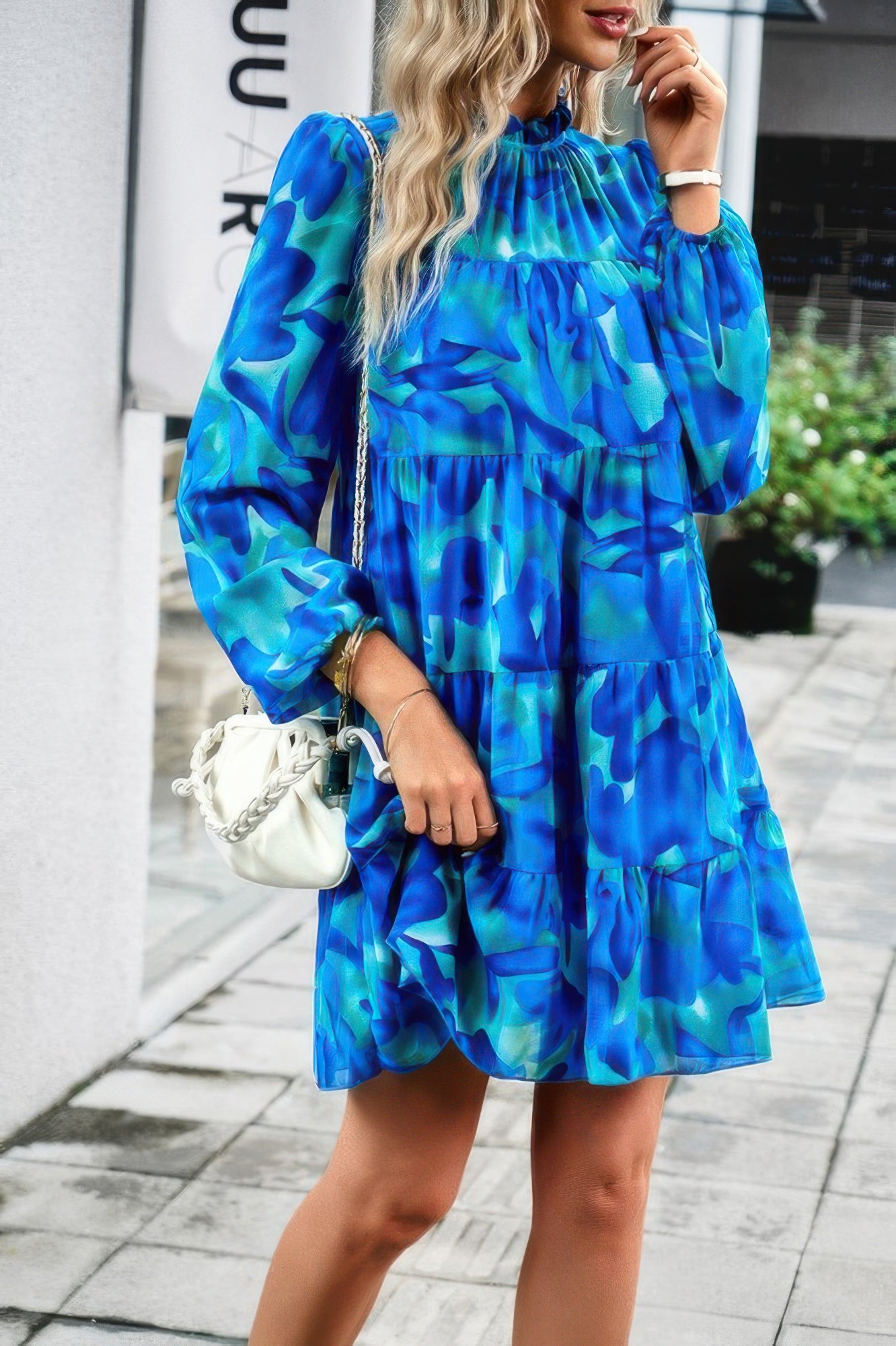 CCWHOLESALECLOTHING abstract print tiered dress in blue green with long puff sleeves and ruffle neck