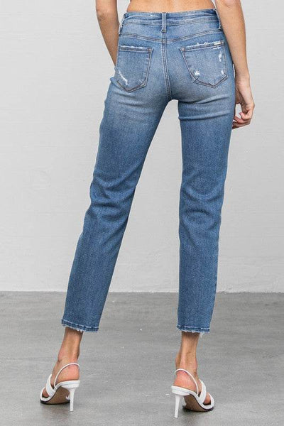 Mid-Rise Slim Girlfriend Jeans with Ripped Details - Fashions Envy