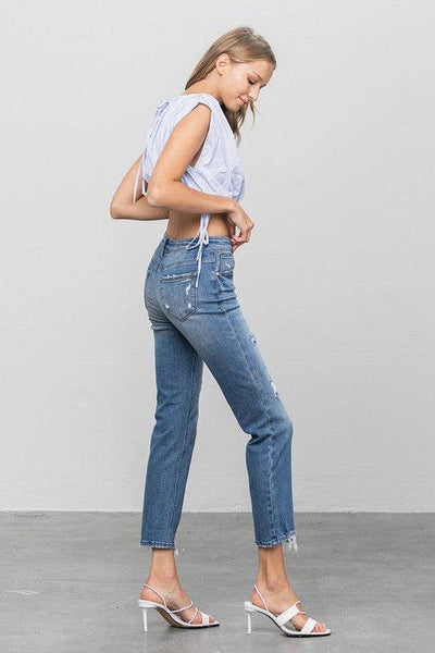 Mid-Rise Slim Girlfriend Jeans with Ripped Details - Fashions Envy