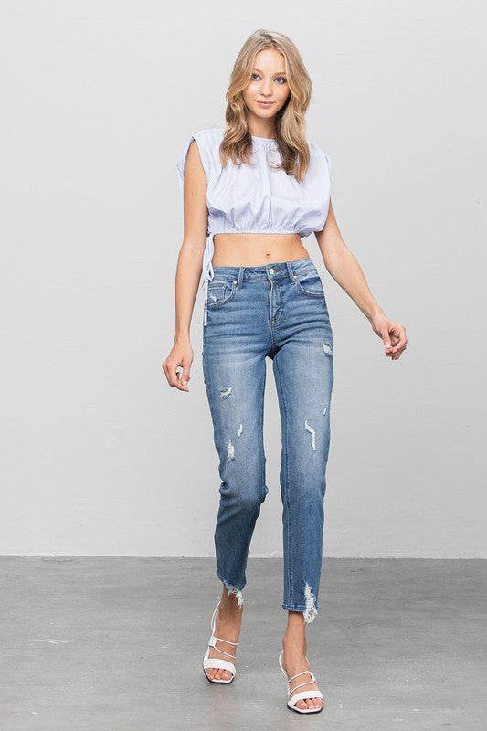 Mid-Rise Slim Girlfriend Jeans with Ripped Details - Fashions Envy