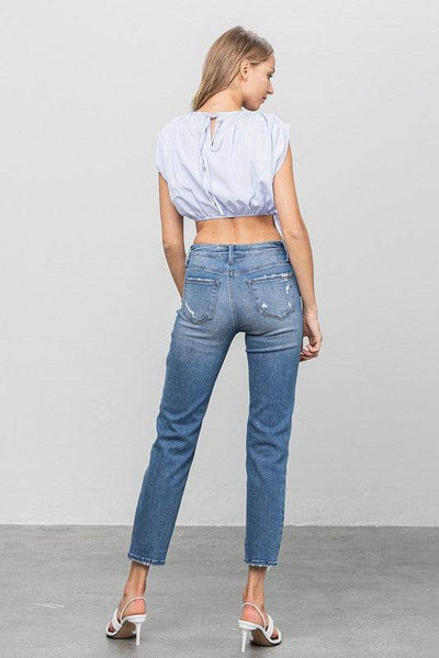 Mid-Rise Slim Girlfriend Jeans with Ripped Details - Fashions Envy