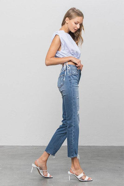 Mid-Rise Slim Girlfriend Jeans with Ripped Details - Fashions Envy