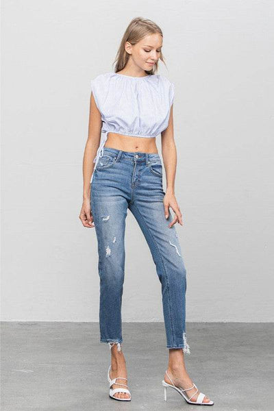 Mid-Rise Slim Girlfriend Jeans with Ripped Details - Fashions Envy