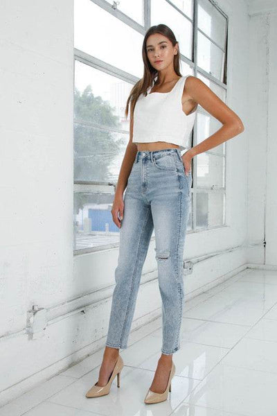 High-Rise Girlfriend Jeans in Light Wash with Ripped Details - Fashions Envy