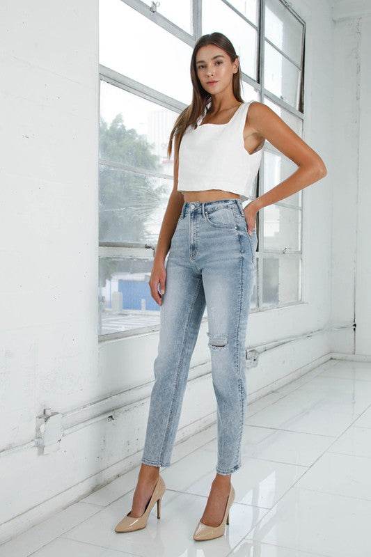 High-Rise Girlfriend Jeans in Light Wash with Ripped Details - Fashions Envy