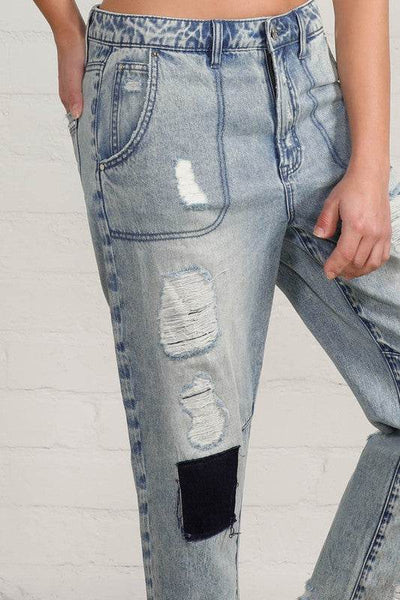 Raw Hem Patched Medium Wash Jeans - Fashions Envy