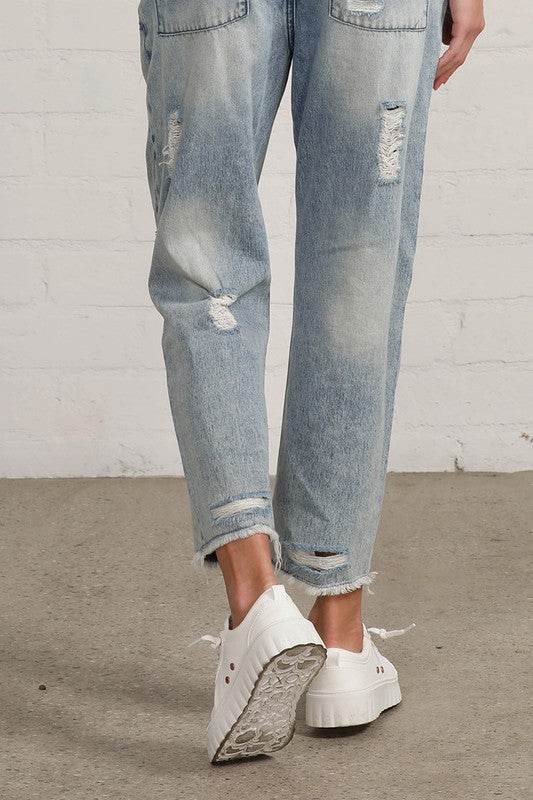 Raw Hem Patched Medium Wash Jeans - Fashions Envy