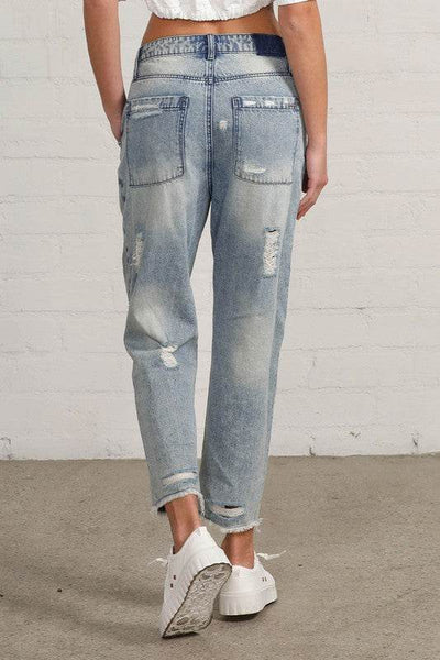 Raw Hem Patched Medium Wash Jeans - Fashions Envy