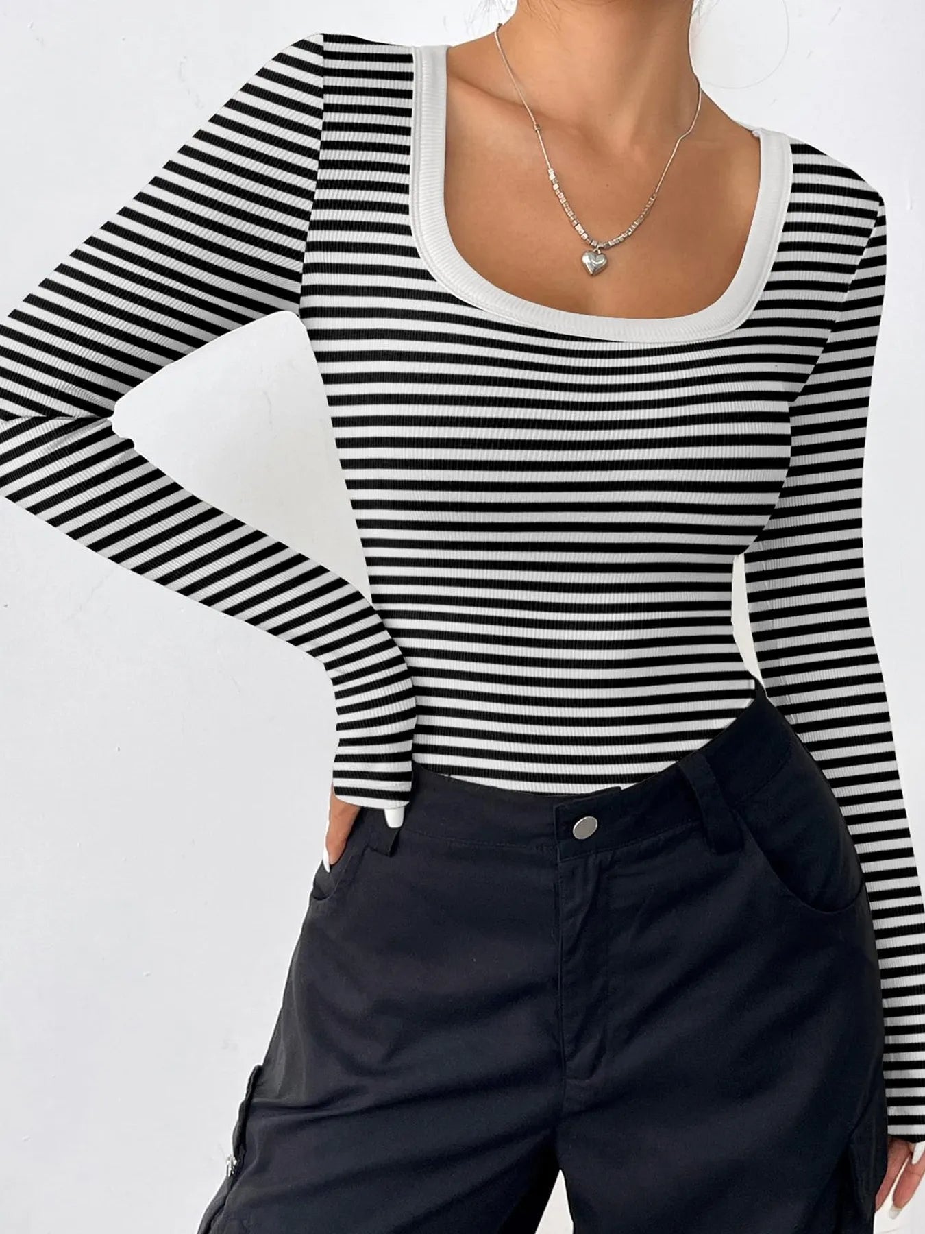 Trendsi black and white striped long sleeve Scoop Neck T-Shirt with white trim styled with black pants