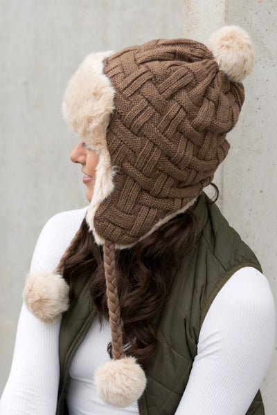 Cable Weave Pom Trapper Hat - Fashions Envy