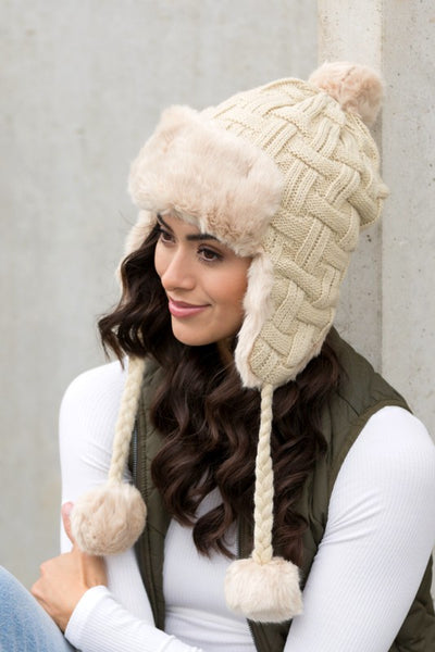 Cable Weave Pom Trapper Hat - Fashions Envy