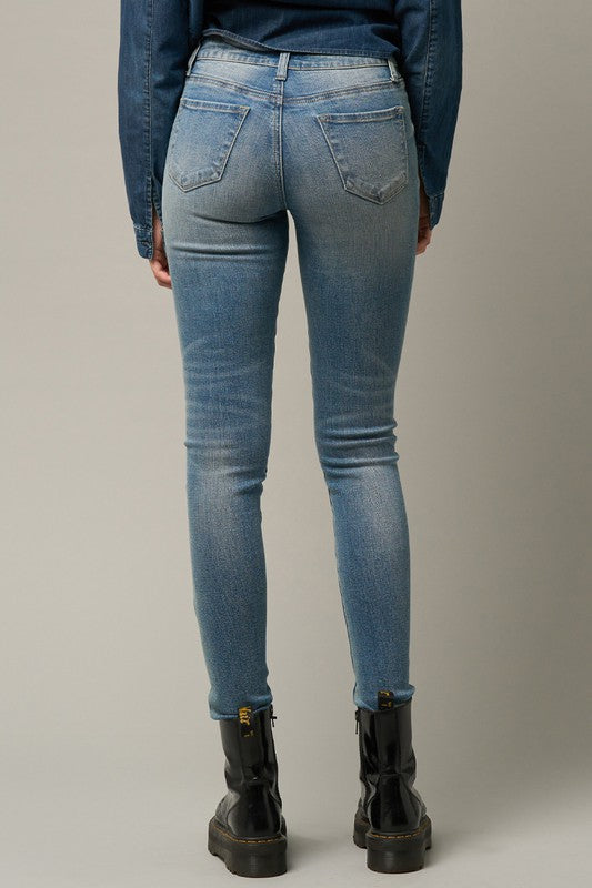 Form-Fitting Mid-Rise Medium Wash Denim Jeans