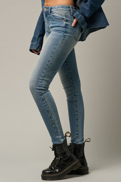 Form-Fitting Mid-Rise Medium Wash Denim Jeans