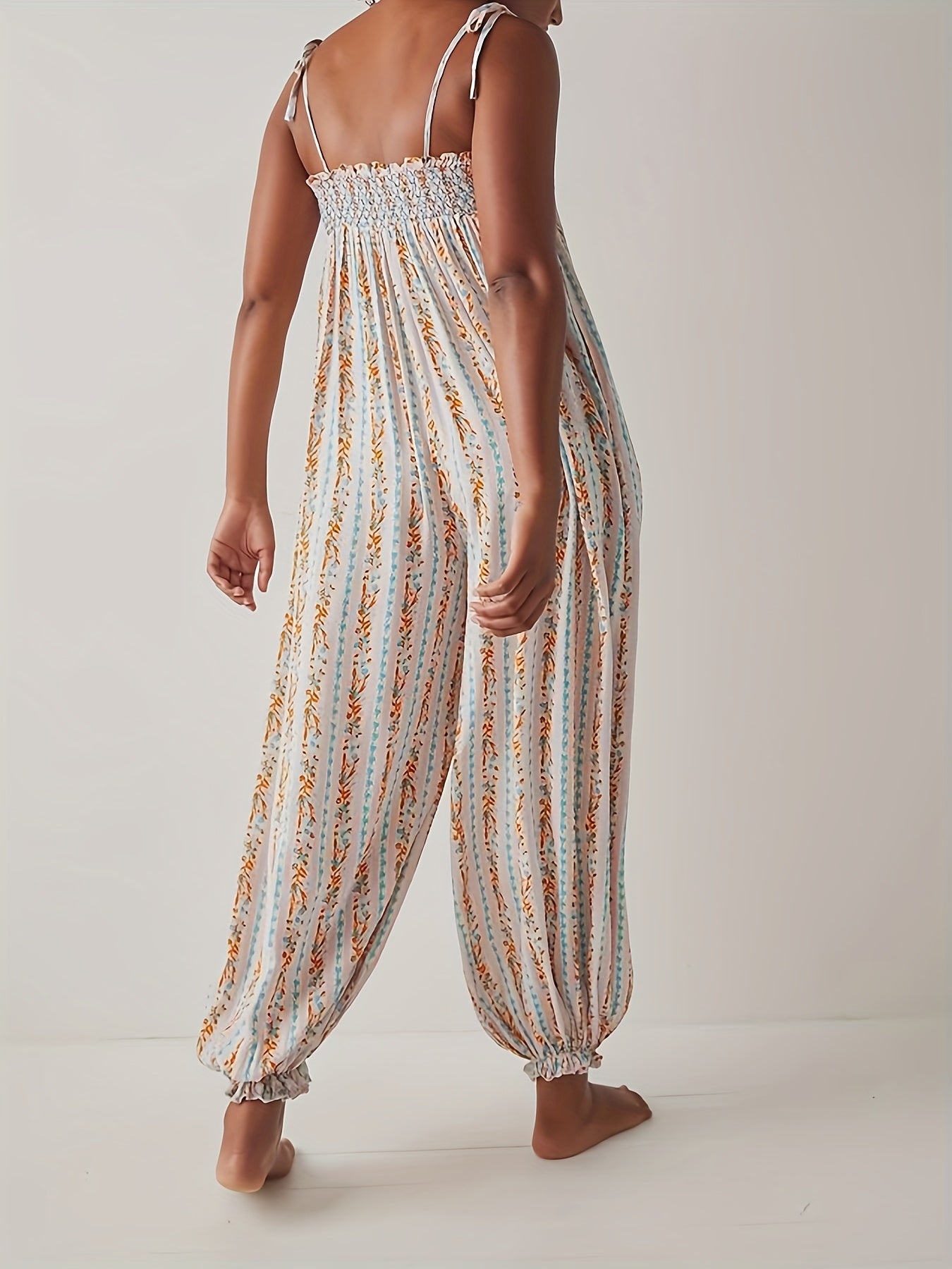 Sleeveless Flowy Vibrant Striped Jumpsuit with Lace Trim