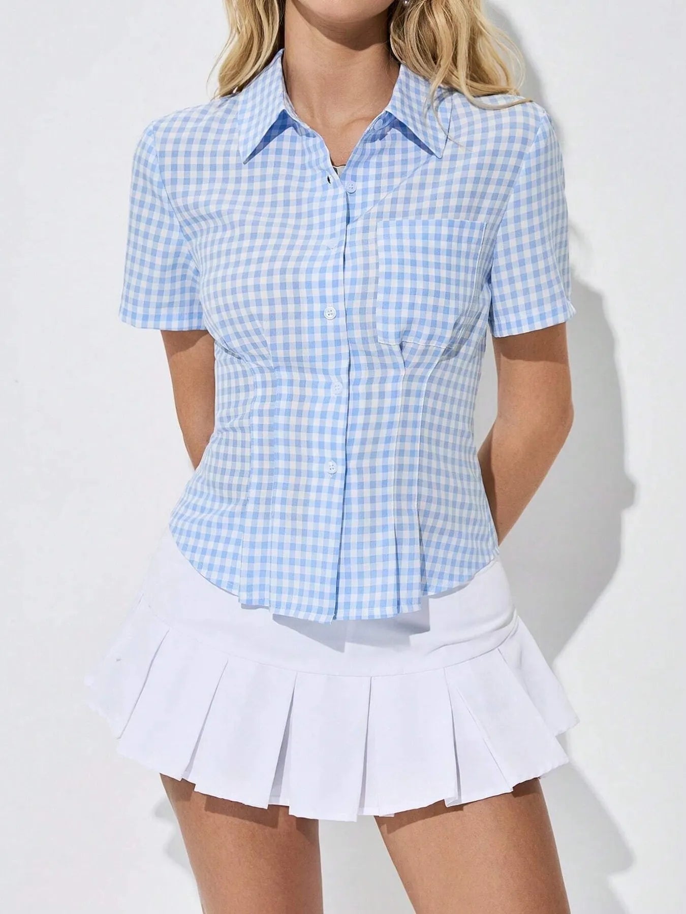 Trendsi light blue gingham Short Sleeve Button-Up Shirt fitted collared style paired with white pleated mini skirt