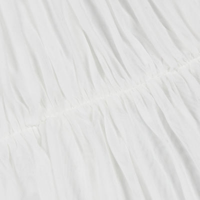 Close-up of white fabric with subtle texture