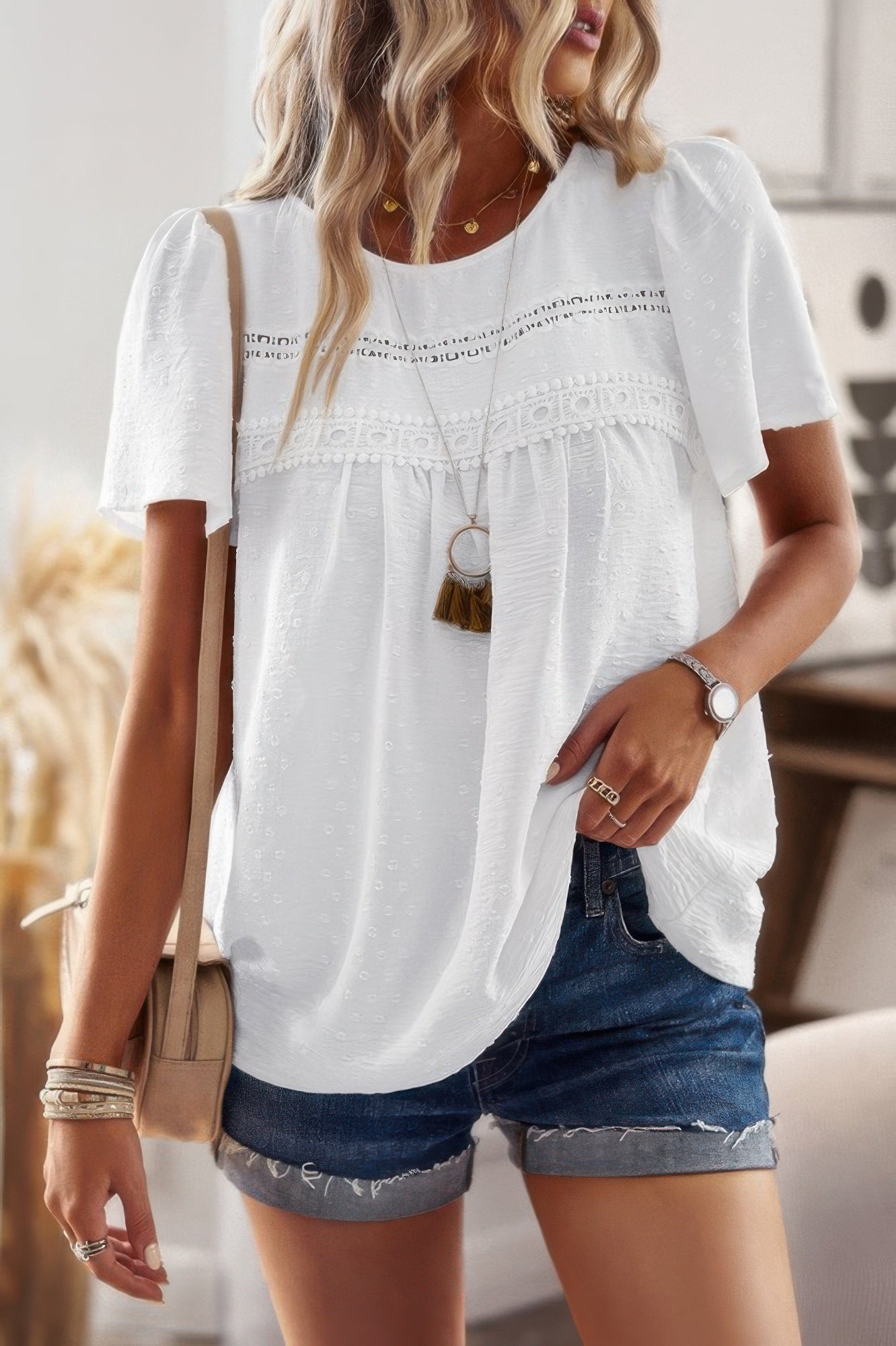 plus size solid short sleeve top white textured blouse with lace yoke and flutter sleeves styled with denim shorts