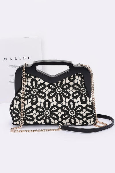Black and white crochet wood frame clutch with floral lace overlay and gold chain strap by CCWHOLESALECLOTHING