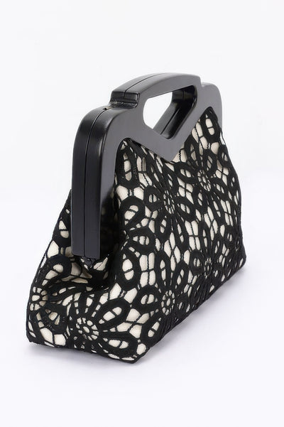 CCWHOLESALECLOTHING crochet wood frame clutch with black floral crochet overlay and glossy handle