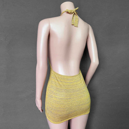 Stylish backless mini dress in yellow with a halter neck design for a chic summer look