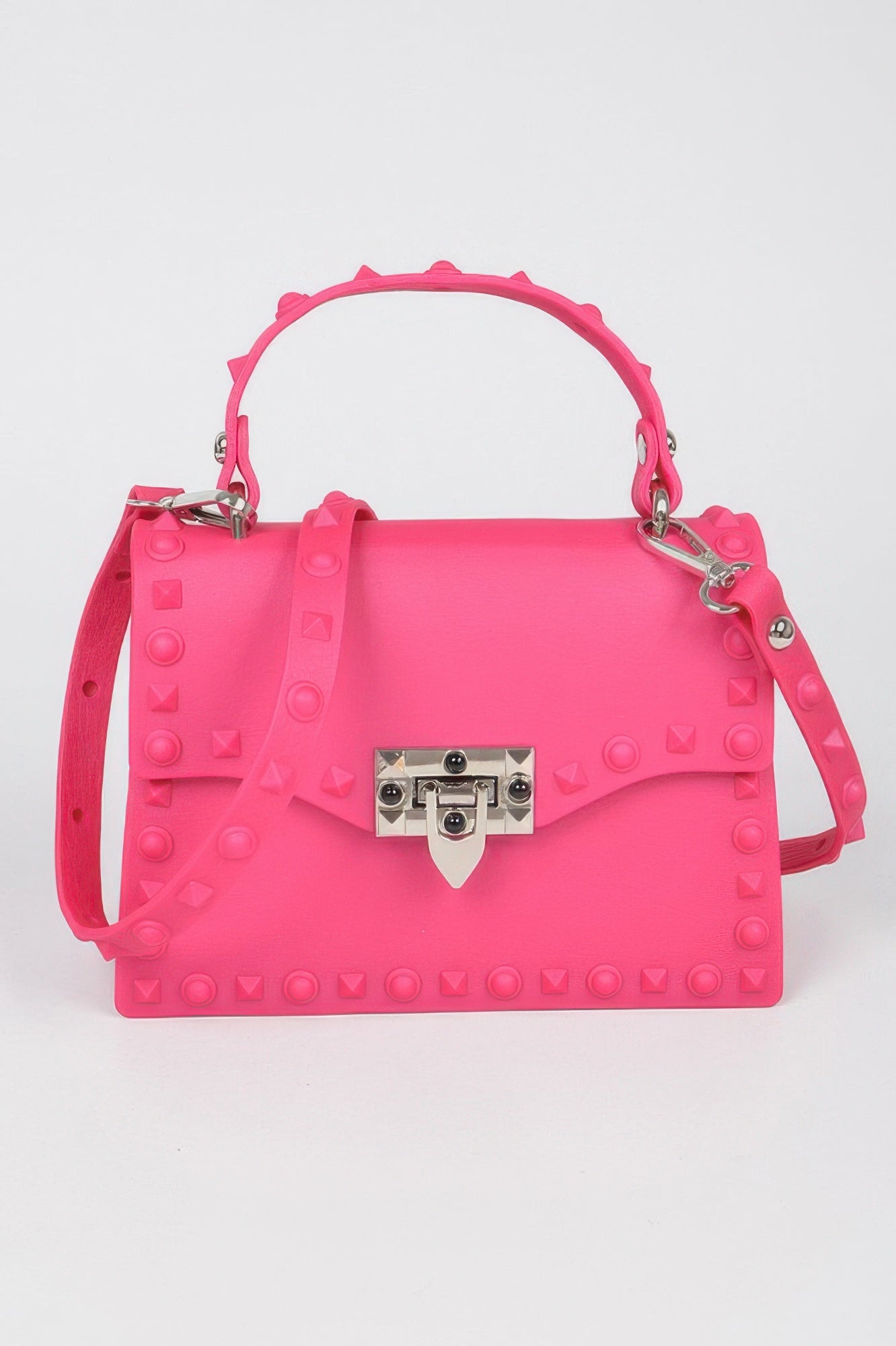 Monotone Studded Clutch bright pink top handle bag with shoulder strap silver turn lock and stud details