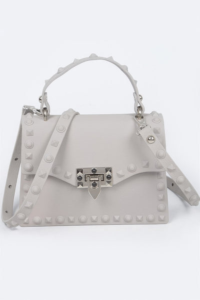 Monotone Studded Clutch by CCWHOLESALECLOTHING light gray top handle bag with silver lock and studded strap