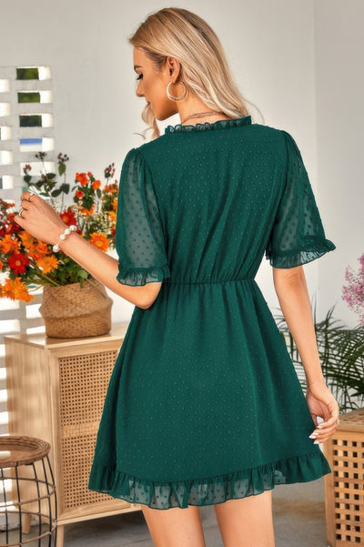 CCWHOLESALECLOTHING emerald green swiss dot ruffle midi dress back view with ruffled hem