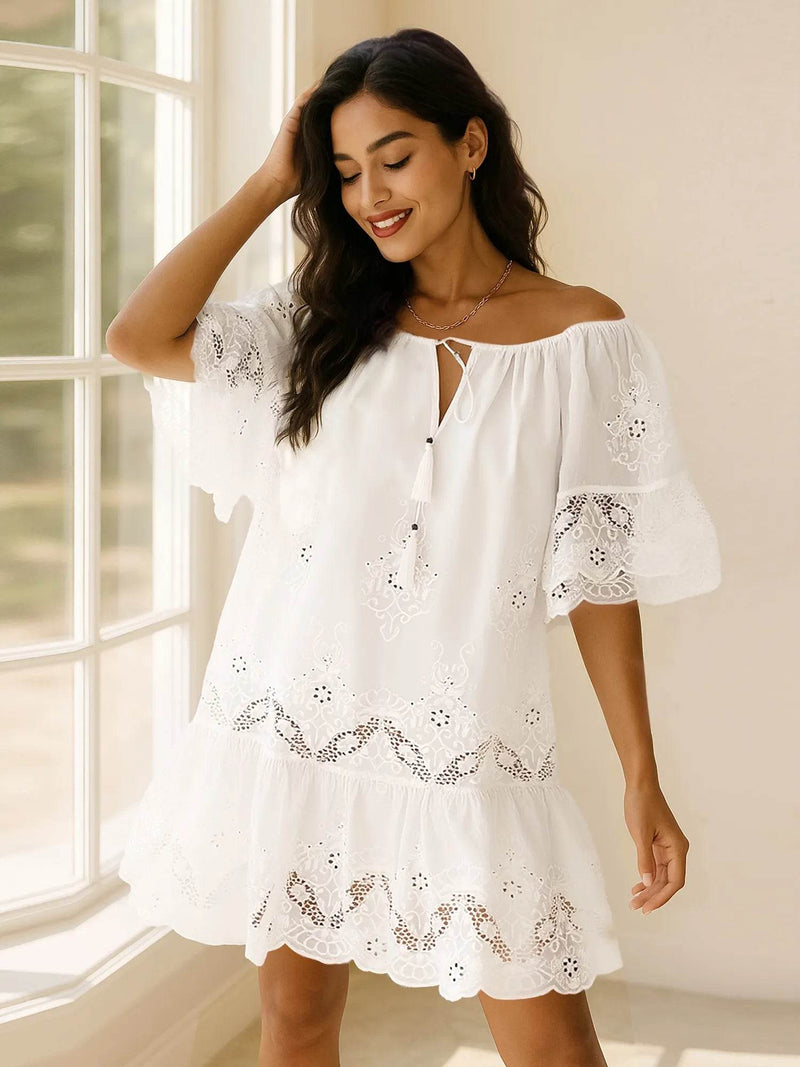 Eyelet Embroidered Tassel Tie Neck Dress - Boho Mini Dress - Fashions Envy