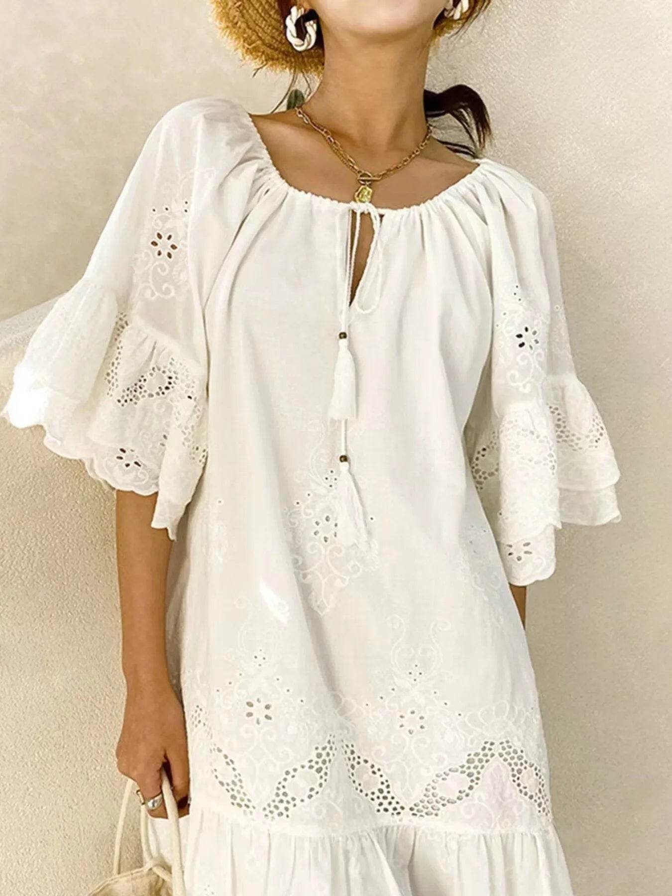 Eyelet Embroidered Tassel Tie Neck Dress - Boho Mini Dress - Fashions Envy