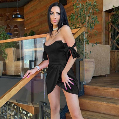 Trendsi Halter Mini Dress black short cocktail dress with side drape bow sleeve detail on model