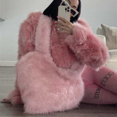 Trendsi pink faux fur Heart Messenger Bag styled with matching fluffy coat in mirror selfie