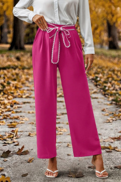 Magenta tie belt high waist straight leg pants for women with white blouse and sandals on autumn path