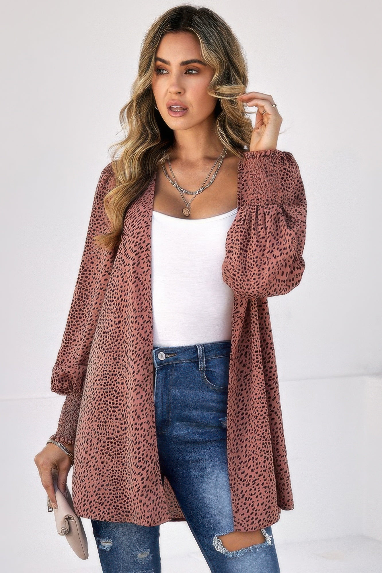 CCWHOLESALECLOTHING model wearing a rust and black leopard print front open top over white tank and distressed jeans