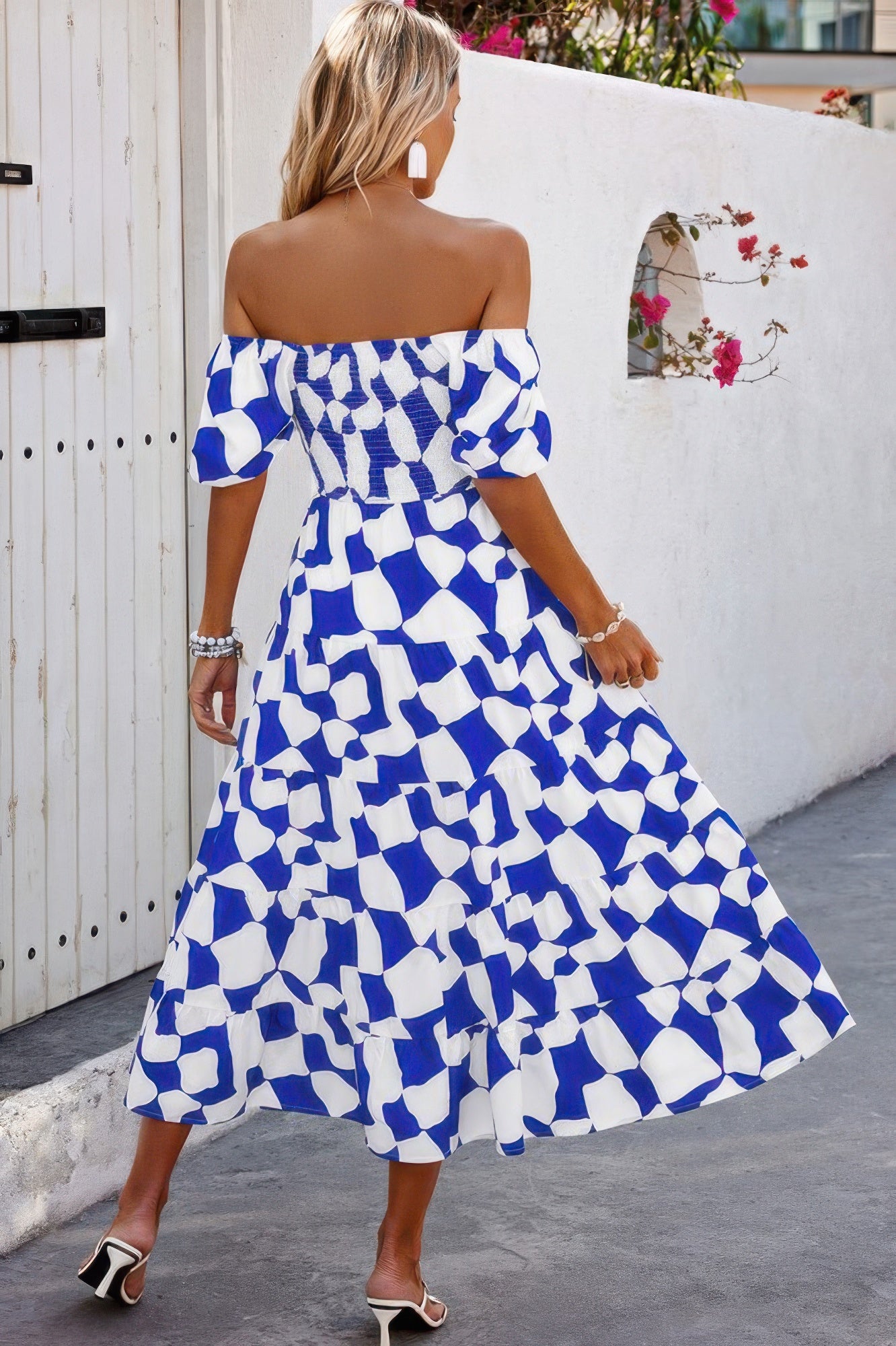Woman wearing CCWHOLESALECLOTHING off shoulder ruched ruffle dress blue white geometric midi