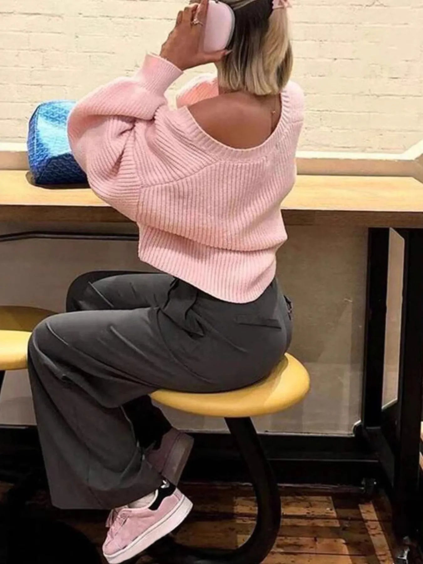 Trendsi Open Front Cardigan pink ribbed knit worn off shoulder with gray wide leg pants and pink sneakers