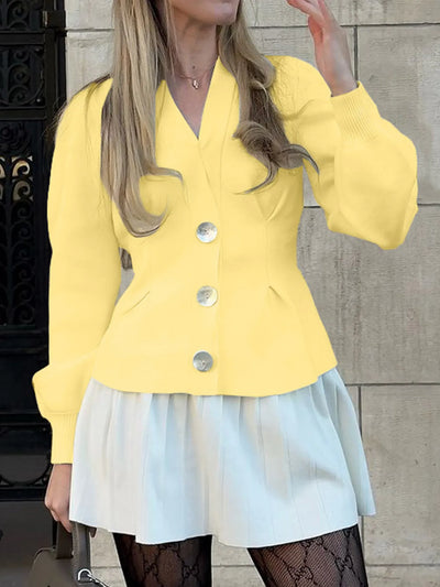 Trendsi yellow women's button-up knit cardigan with puff sleeves and large buttons paired with pleated mini skirt